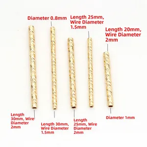 Macro view of gold plated brass curved tubes in various sizes for DIY jewelry making