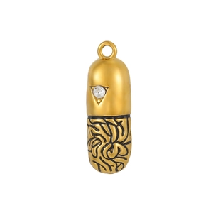 Detailed close-up of capsule pendant with sparkling zircon and engraved swirl pattern
