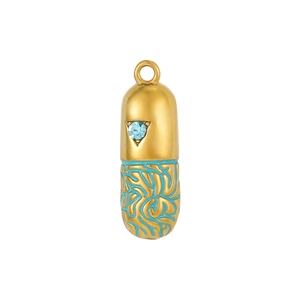 Detail of capsule pendant with light blue crystal and green enamel coral texture