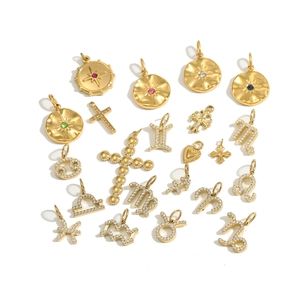 Goldene Sternzeichen-Anhänger und Vintage-Kreuze mit Zirkonia-Steinen und Edelsteinen
