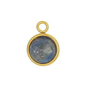 Close-up of a circular lapis lazuli pendant with gold-plated bezel setting detail