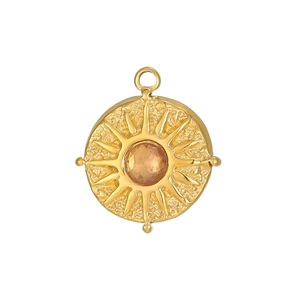 Detailed view of vintage gold stainless steel sunburst pendant with brown zircon stone