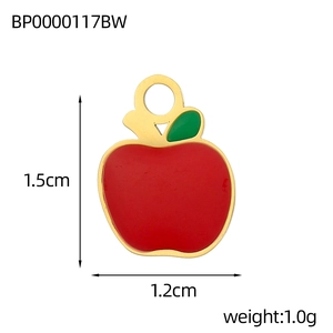 Macro view of 18K gold plated red apple charm showing dimensions 1.5cm by 1.2cm