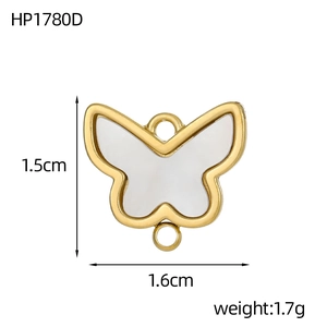 Makro-Detail des Schmetterling-Schmuckverbinders mit Vergoldung und weißem Perlmutt