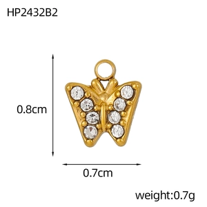 Detailansicht Schmetterling Anhänger mit Zirkonia, Gold-Optik, Maße 0,8cm x 0,7cm groß