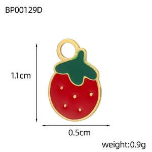 Detail view of red strawberry fruit charm with dimensions 1.1cm by 0.5cm and weight 0.9g
