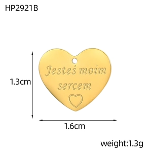Detail of heart pendant with polish text engraving and size dimensions 1.6cm x 1.3cm