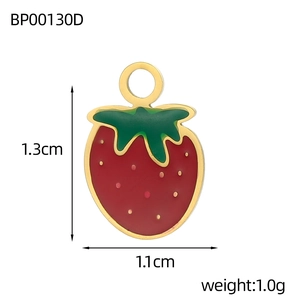 Detail view of a 1.3x1.1cm red strawberry pendant with golden borders and loop