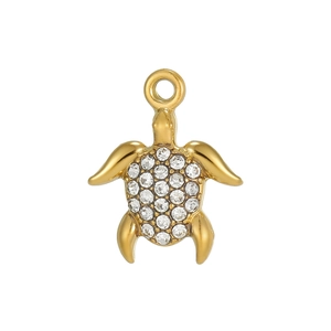 Detailed view of turtle pendant with micro-pave cubic zirconia on polished gold plating
