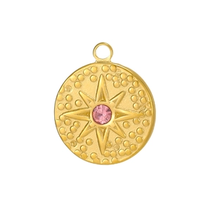 Detailed view of a gold tarot pendant with pink zircon starburst and textured finish