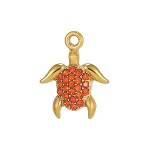 Detailed close-up of a golden sea turtle pendant with orange zircon crystal shell