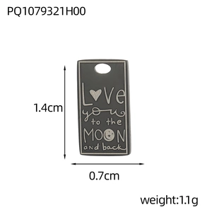 Detail view of rectangular steel pendant with dimensions 1.4cm by 0.7cm and moon engraving
