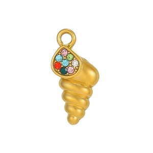 Close-up of golden seashell pendant with multi-color rhinestones on a white background