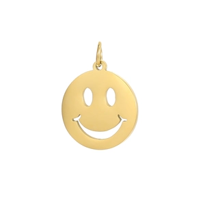 Close-up of a polished gold-plated circular pendant with a hollowed-out smiley face design