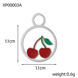 Macro view of 18K gold plated cherry charm with red enamel and 1.1cm size details