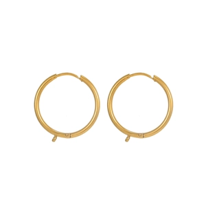 Detailed macro view of gold-plated geometric hoop earrings with integrated small eyelets