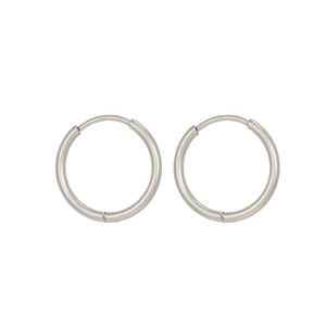Detailed view of polished silver geometric hoop earrings in a minimalist heart shape design