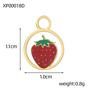 Detail shot of a small colorful enamel strawberry charm with 1.1cm size markings