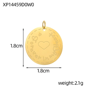 Detail of round golden stainless steel pendant with Forever in my heart engraving