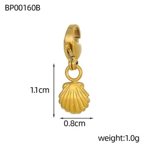 Detail of golden scallop shell pendant with lobster clasp and stainless steel finish