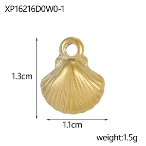 Detailed close-up of 18K gold plated shell pendant with fine texture and dimensions