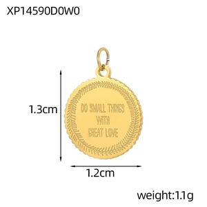 Detail of round gold pendant with Do Small Things With Great Love engraving and coin edge