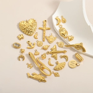 DIY jewelry making kit featuring assorted golden stainless steel charms and pendants