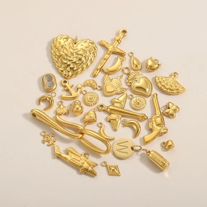 Golden stainless steel mini pendant set featuring heart, cross, and moon shapes for DIY jewelry
