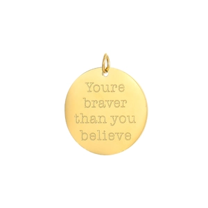 Detail of round gold stainless steel pendant engraved with You're braver than you believe