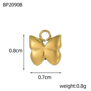 Detailed view of a gold butterfly pendant for DIY jewelry with size measurements
