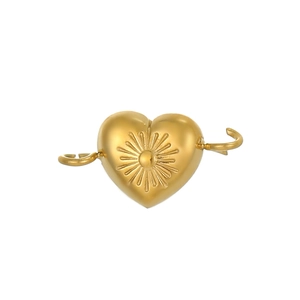 Detailed close-up of a gold heart charm with sunburst pattern and dual side connectors