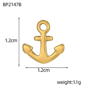 Detailed view of a 1.2cm golden anchor pendant with size and weight specifications