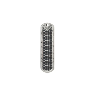 Macro view of vintage rectangular steel pendant with black textured granules inlay
