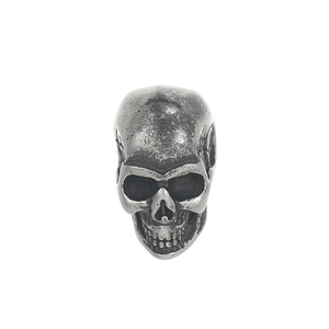 Detailed view of a vintage gothic skull pendant made from antiqued stainless steel
