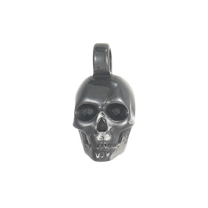 Detail view of retro skull pendant in stainless steel with vintage textured finish