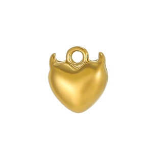 Detailed view of a golden heart-shaped pendant with small devil horns and polished finish