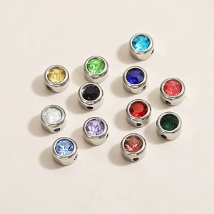 Detailed macro view of 6mm stainless steel birthstone charms for DIY jewelry making