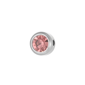 Close-up of a 6mm silver stainless steel charm with a pink birthstone for jewelry DIY
