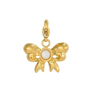 Detail of gold bow charm with hammered texture and central white bead on lobster clasp