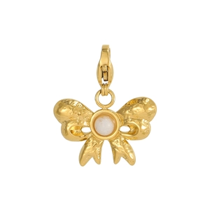 Detailed view of vintage gold bow pendant with hammered texture and white natural stone