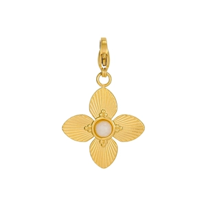 Macro shot of gold four-petal floral pendant with a centered white stone and lobster clasp