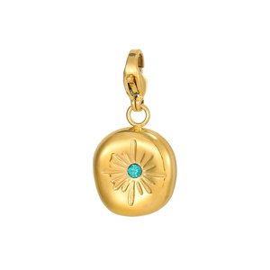 Detail of vintage heart tarot pendant with blue zircon and sunburst engraving