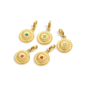 Set of five retro stainless steel gold evil eye pendants with colorful crystal stones