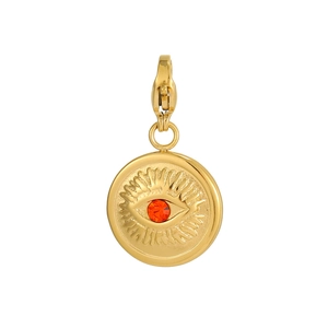Detailed macro view of a gold-plated evil eye pendant with an orange gemstone