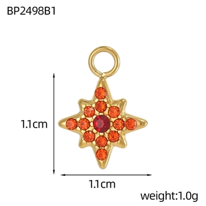 Ciondolo stella a otto punte dorata con strass rosso e zircone arancione, misura 1,1 cm