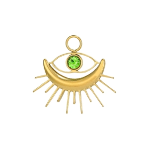 Detailed view of tarot evil eye heart pendant with green gemstone and golden rays