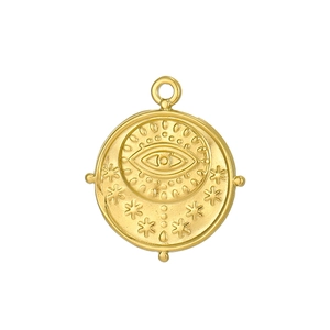 Detailed macro view of a gold-plated baroque evil eye pendant with embossed details