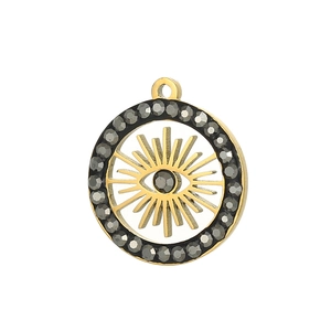 Detail of gold evil eye pendant with radial hollow design and dark grey crystals