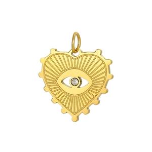 Macro detail of a golden heart pendant with Evil Eye center and radiant textures