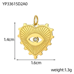 Detailed view of gold heart pendant with cubic zirconia evil eye and size dimensions